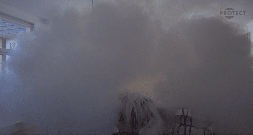 Interior space filling with dense white security fog after an intrusion